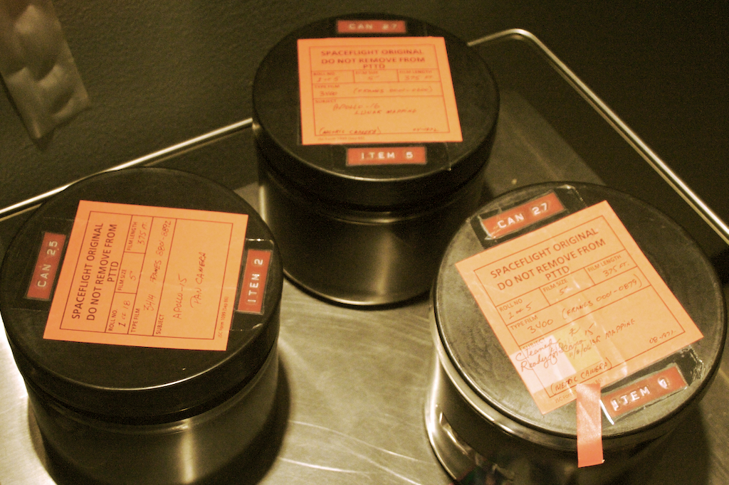 three apollo flight film canisters
