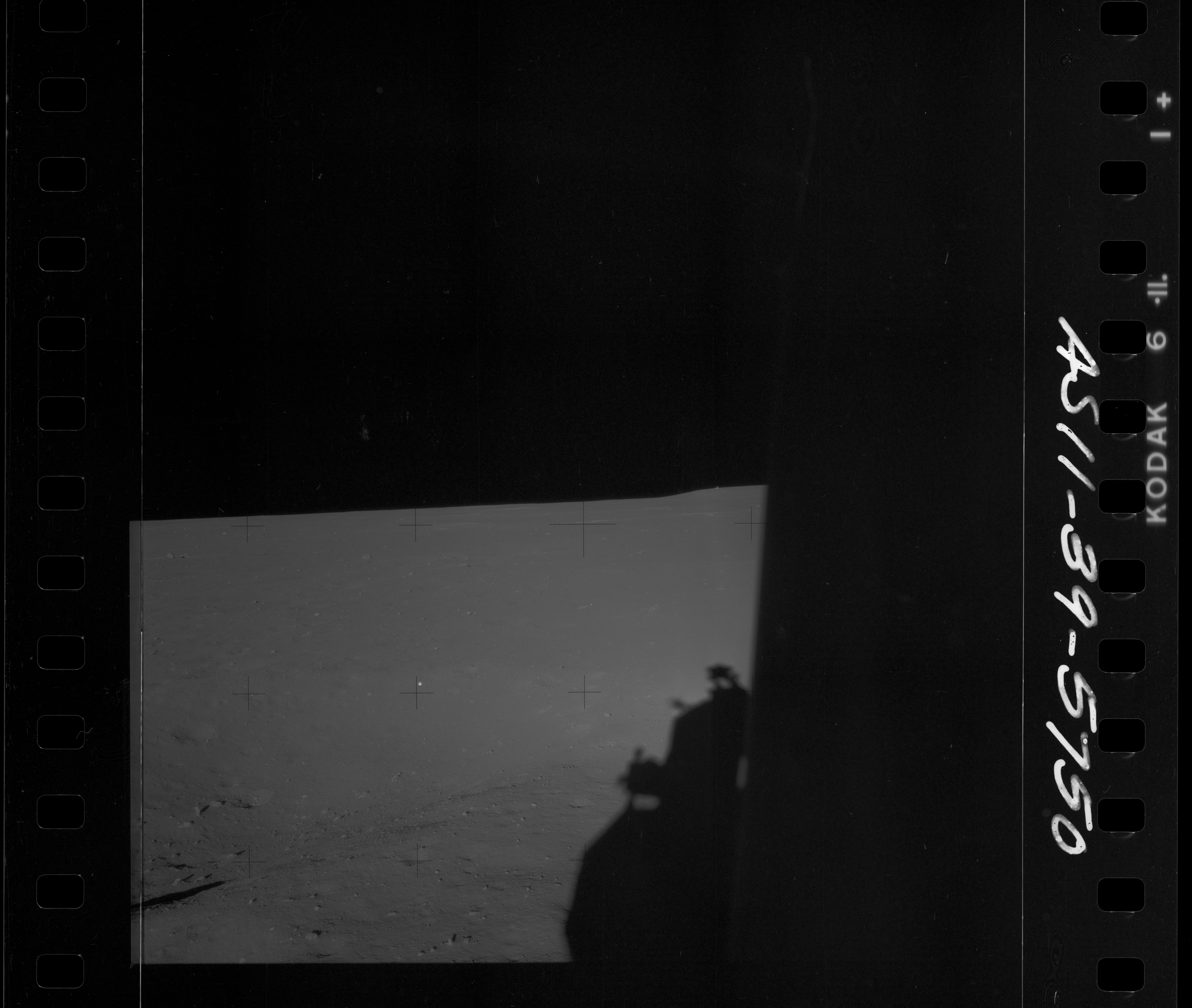 SHADOW OF LUNAR MODULE ON LUNAR SURFACE